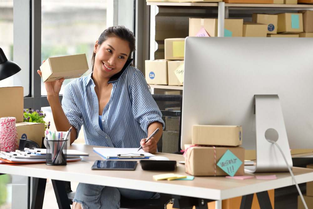 Female entrepreneur looking at her online store