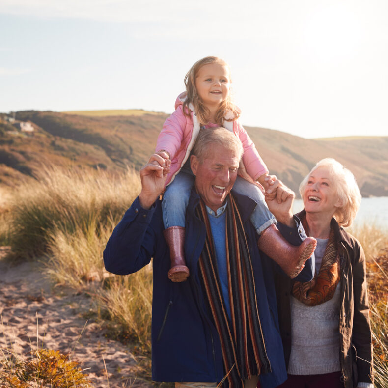 best pension provider uk. grandfather with wife and grandchild.